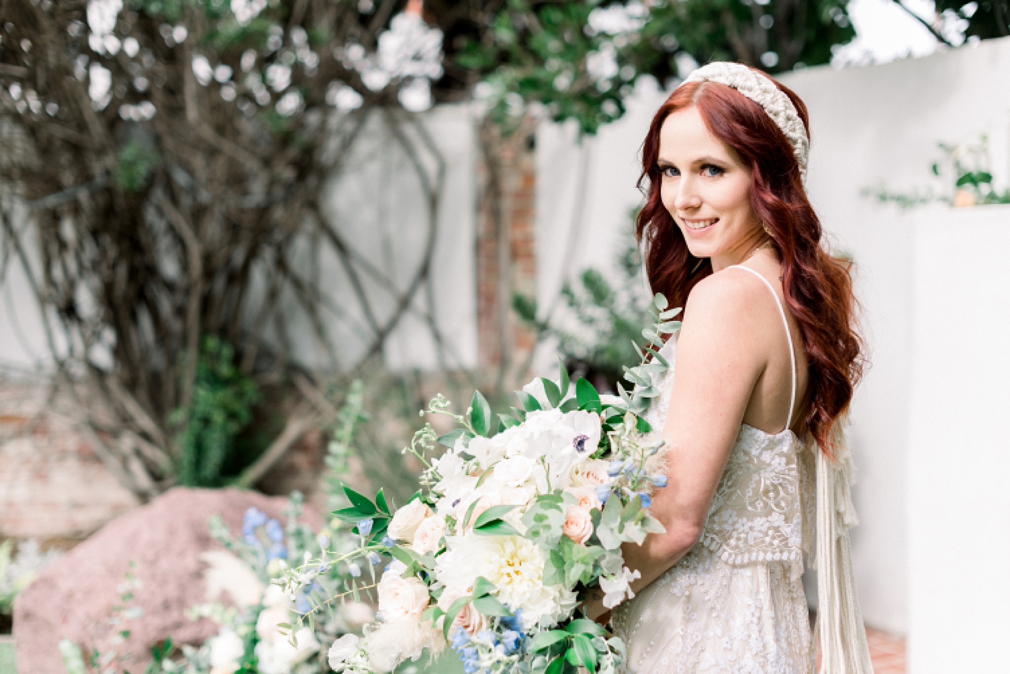 Bride holding a bouquet at Orange County Outdoor Wedding Venues