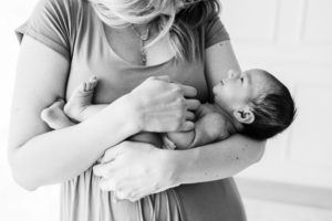 Mother holding baby at Women's Wellness Center in Mission Viejo, California