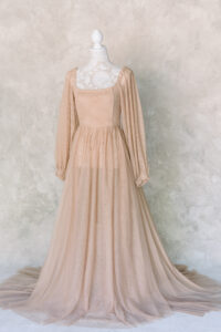 Gorgeous long Reclamation Dress on a dress form as a maternity option for clients who want to shoot maternity photography with Amy Captures Love in Orange County, California